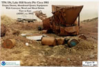 Thumbnail photo of empty drums, abandoned quarry equipment with conveyors, and wood and metal debris at Lake Hill Scoria Pit.