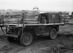 Thumbnail photo of truck transporting construction supplies.