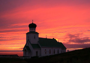 Photo of church at sunset.